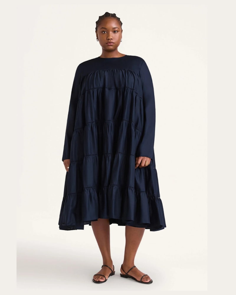 Front of a model wearing a size XL Essaouira Dress in Navy by Merlette. | dia_product_style_image_id:323514